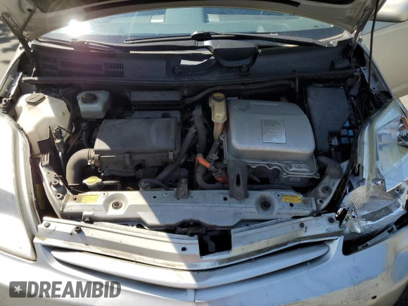 2005 Toyota Prius z VIN JTDKB20U053065387, wystawiony jako Copart lot #58809325 z przebiegiem 249 936 mil mil oraz Szkoda całkowita • Salvage title. Historia ofert i sprzedaży dostępna na DreamBid. Obrazek 12.