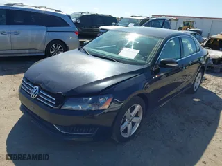 2013 Volkswagen Passat SE w/Sunroof with VIN 1VWBH7A36DC020984, listed as a IAAI auction lot 41883902 with 169,916 mi miles. Bid and sale history available at carsss.com. Image 17.