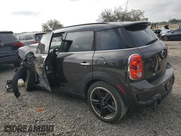 2015 MINI Countryman S with VIN WMWZC3C57FWP52868, listed as a Copart auction lot 54909085 with 68,003 mi miles and Salvage title. Bid and sale history available at DreamBid. Image 2.