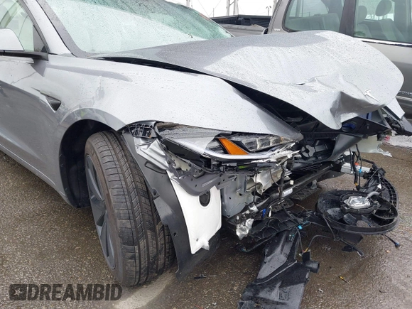 2025 Tesla Model 3 Long Range with VIN 5YJ3E1EA2SF885408, listed as a IAAI auction lot 41778498 with 1,566 mi miles and . Bid and sale history available at DreamBid. Image 19.