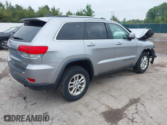 2018 Jeep Grand Cherokee Laredo z VIN 1C4RJFAG0JC129021, wystawiony jako IAAI lot #42413165 z przebiegiem 103 743 mil mil oraz . Historia ofert i sprzedaży dostępna na DreamBid. Obrazek 4.