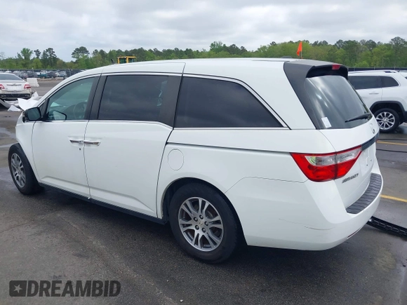 2012 Honda Odyssey EX-L with VIN 5FNRL5H60CB134954, listed as a IAAI auction lot 41942488 with 192,069 mi miles and . Bid and sale history available at DreamBid. Image 3.