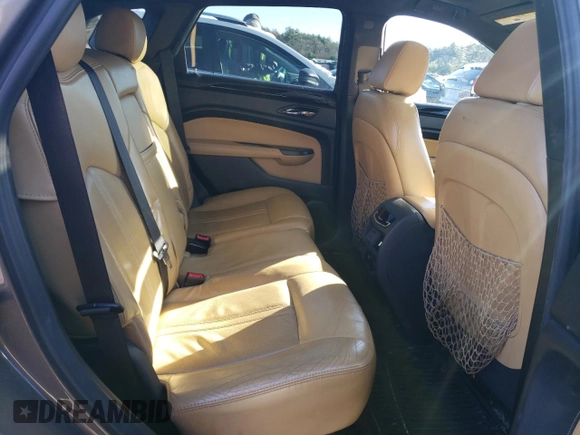 2014 Cadillac SRX Premium Collection z VIN 3GYFNGE37ES566089, wystawiony jako Copart lot #83595454 z przebiegiem 209 155 mil mil oraz Szkody całkowita. Historia ofert i sprzedaży dostępna na DreamBid. Obrazek 11.