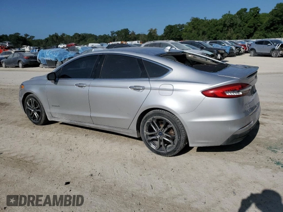 2019 Ford Fusion Titanium with VIN 3FA6P0RU1KR209297, listed as a Copart auction lot 54358065 with 122,600 mi miles and Salvage Title. Bid and sale history available at DreamBid. Image 2.