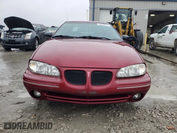 1997 Pontiac Grand Am SE z VIN 1G2NE52T4VC747929, wystawiony jako Copart lot #43959975 z przebiegiem 142 673 mil mil oraz Szkoda całkowita • Salvage title. Historia ofert i sprzedaży dostępna na DreamBid. Obrazek 5.