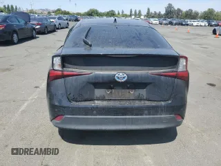 2022 Toyota Prius L Eco с VIN JTDKAMFU3N3161049, выставлен на аукционе Copart как лот 59818135 с пробегом 81 272 миль миль и Списание • Salvage title. История ставок и продаж доступна на DreamBid. Изображение 6.