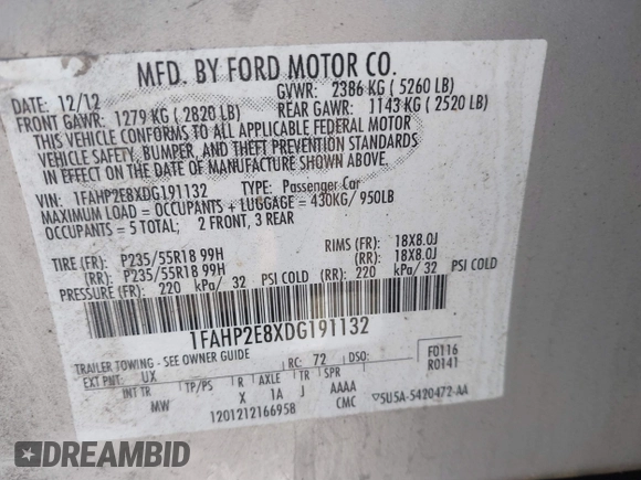 2013 Ford Taurus SEL with VIN 1FAHP2E8XDG191132, listed as a IAAI auction lot 41833542 with 165,125 mi miles. Bid and sale history available at carsss.com. Image 9.