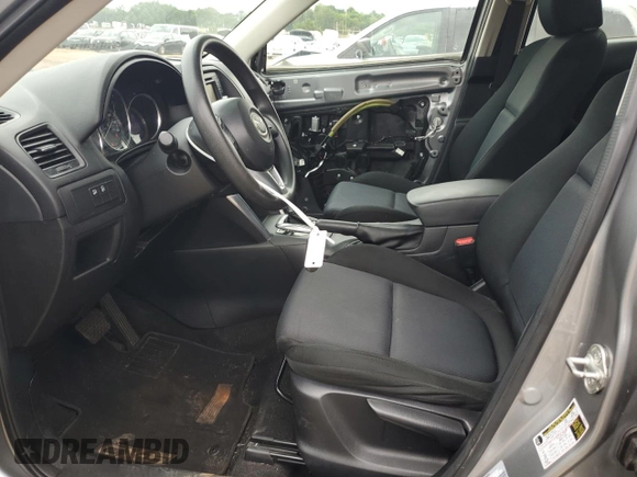 2015 Mazda CX-5 Sport z VIN JM3KE2BE4F0459532, wystawiony jako Copart lot #61049235 z przebiegiem 149 808 mil mil oraz Szkoda całkowita • Salvage title. Historia ofert i sprzedaży dostępna na DreamBid. Obrazek 7.