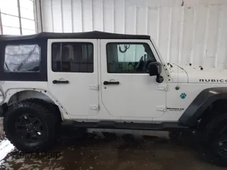 2016 Jeep Wrangler Unlimited Rubicon with VIN 1C4HJWFG4GL127379, listed as a IAAI auction lot 41732688 with 110,193 mi miles. Bid and sale history available at carsss.com. Image 13.