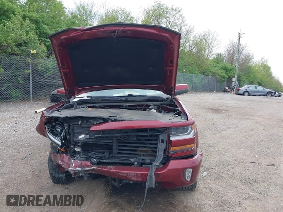 2017 Chevrolet Silverado 1500 LT with VIN 3GCUKREC5HG319937, listed as a IAAI auction lot 42073970 with 99,219 mi miles and . Bid and sale history available at DreamBid. Image 13.