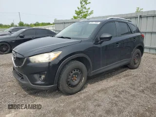 2014 Mazda CX-5 Touring z VIN JM3KE2CYXE0362990, wystawiony jako Copart lot #59417905 z przebiegiem 186 857 mil mil oraz Szkoda całkowita • Salvage title. Historia ofert i sprzedaży dostępna na DreamBid. Obrazek 1.