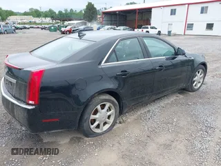 2009 Cadillac CTS RWD with VIN 1G6DF577190137609, listed as a IAAI auction lot 42196209 with 111,843 mi miles and . Bid and sale history available at DreamBid. Image 4.