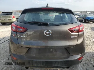 2018 Mazda CX-3 Touring z VIN JM1DKDC79J0311181, wystawiony jako Copart lot #54307795 z przebiegiem 141 348 mil mil oraz Czysty tytuł • Clean title. Historia ofert i sprzedaży dostępna na DreamBid. Obrazek 6.