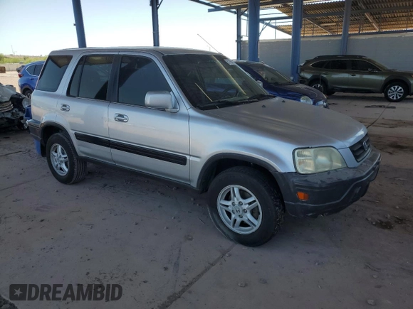 2000 Honda CR-V EX z VIN JHLRD1863YC049913, wystawiony jako Copart lot #57705385 z przebiegiem 269 412 mil mil oraz Szkoda całkowita • Salvage title. Historia ofert i sprzedaży dostępna na DreamBid. Obrazek 4.