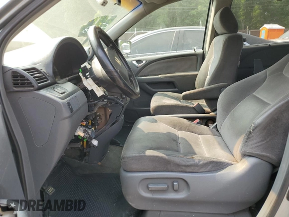 2006 Honda Odyssey EX z VIN 5FNRL38416B122268, wystawiony jako Copart lot #58969785 z przebiegiem 167 991 mil mil oraz Szkoda całkowita • Salvage title. Historia ofert i sprzedaży dostępna na DreamBid. Obrazek 7.