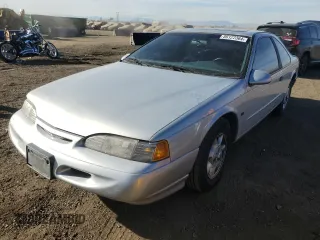 1995 Ford Thunderbird LX with VIN 1FALP62W4SH187234, listed as a Copart auction lot 86122364 with 57,256 mi miles and Clean Title. Bid and sale history available at DreamBid. Image 1.