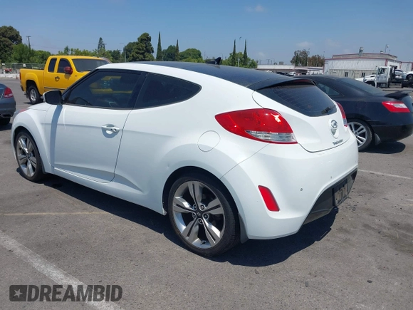 2013 Hyundai Veloster w/Black Int with VIN KMHTC6AD8DU174885, listed as a IAAI auction lot 42408175 with 132,366 mi miles and . Bid and sale history available at DreamBid. Image 3.