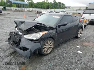 2013 Hyundai Veloster w/Gray Int z VIN KMHTC6AD8DU113990, wystawiony jako Copart lot #54571895 z przebiegiem 181 757 mil mil oraz Szkoda całkowita • Salvage title. Historia ofert i sprzedaży dostępna na DreamBid. Obrazek 1.