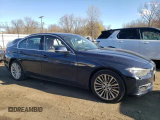 2015 BMW 3 Series 328i xDrive z VIN WBA3B5C55FF962857, wystawiony jako Copart lot #52691015 z przebiegiem 129 523 mil mil oraz Nie do naprawy • Non repairable. Historia ofert i sprzedaży dostępna na DreamBid. Obrazek 4.