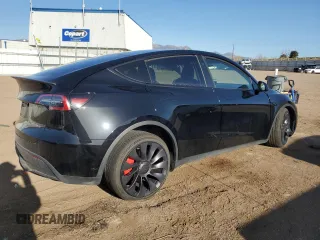 2023 Tesla Model Y Performance with VIN 7SAYGDEF3PF847225, listed as a Copart auction lot 52171135 with 29,724 mi miles and Salvage Title. Bid and sale history available at DreamBid. Image 3.