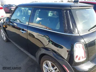 2011 MINI Cooper Hardtop with VIN WMWSU3C56BT093420, listed as a IAAI auction lot 41704260 with 142,408 mi miles. Bid and sale history available at carsss.com. Image 6.