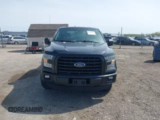 2015 Ford F-150 XLT with VIN 1FTEW1EG3FKE16010, listed as a IAAI auction lot 42107938 with 242,625 mi miles and . Bid and sale history available at DreamBid. Image 12.