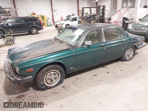 1985 Jaguar XJ with VIN SAJAV1347FC414864, listed as a IAAI auction lot 42118511 with 117,185 mi miles and . Bid and sale history available at DreamBid. Image 17.