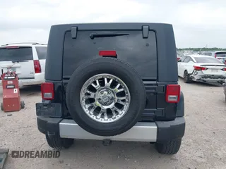 2008 Jeep Wrangler Unlimited Sahara с VIN 1J4GA59188L624010, выставлен на аукционе IAAI как лот 42115574 с пробегом 105 800 миль миль и . История ставок и продаж доступна на DreamBid. Изображение 16.