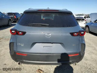 2023 Mazda CX-50 2.5 S Premium Plus Package with VIN 7MMVABEM2PN107512, listed as a Copart auction lot 38534253 with 9,591 mi miles. Bid and sale history available at carsss.com. Image 6.