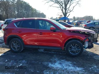 2017 Mazda CX-5 Touring with VIN JM3KFBCL1H0227290, listed as a IAAI auction lot 41400188 with 58,801 mi miles. Bid and sale history available at carsss.com. Image 13.