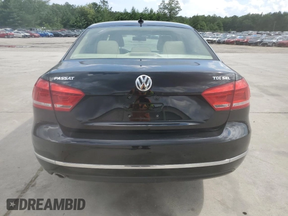 2014 Volkswagen Passat SEL Premium with VIN 1VWCN7A3XEC062797, listed as a Copart auction lot 60290515 with 83,279 mi miles and Salvage title. Bid and sale history available at DreamBid. Image 6.