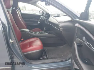 2022 Mazda CX-30 S Carbon Edition with VIN 3MVDMBCL6NM431985, listed as a IAAI auction lot 42610558 with Not provided miles and . Bid and sale history available at DreamBid. Image 5.