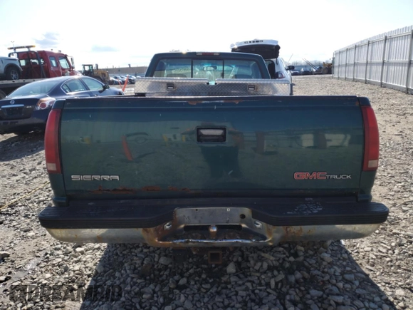 1997 GMC Sierra 1500 SL with VIN 1GTEC14WXVZ505001, listed as a Copart auction lot 53973435 with 217,305 mi miles and Non Repairable. Bid and sale history available at DreamBid. Image 6.