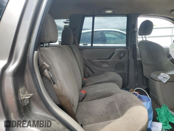 2000 Jeep Grand Cherokee Laredo с VIN 1J4G248S4YC299003, выставлен на аукционе Copart как лот 55937685 с пробегом Не указан миль и Списание • Salvage title. История ставок и продаж доступна на DreamBid. Изображение 10.