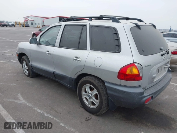 2003 Hyundai Santa Fe LX with VIN KM8SC73E83U568666, listed as a IAAI auction lot 41679044 with 127,560 mi miles. Bid and sale history available at carsss.com. Image 3.