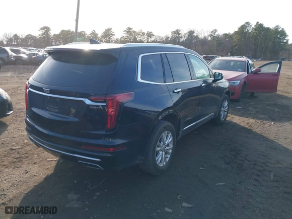 2023 Cadillac XT6 Luxury with VIN 1GYKPBR41PZ136918, listed as a IAAI auction lot 41417724 with 57,949 mi miles. Bid and sale history available at carsss.com. Image 4.