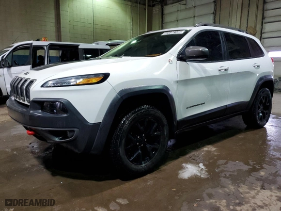 2015 Jeep Cherokee Trailhawk with VIN 1C4PJMBS7FW609741, listed as a Copart auction lot 42336145 with 125,711 mi miles and Clean Title. Bid and sale history available at carsss.com. Image 1.