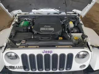 2015 Jeep Wrangler Unlimited Sahara с VIN 1C4HJWEG0FL560973, выставлен на аукционе Copart как лот 59552135 с пробегом 135 057 миль миль и Чистый • Clean title. История ставок и продаж доступна на DreamBid. Изображение 12.