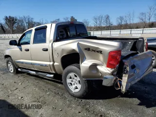 2005 Dodge Dakota Laramie with VIN 1D7HW58N15S326888, listed as a Copart auction lot 43965075 with 87,287 mi miles and Salvage Title. Bid and sale history available at DreamBid. Image 2.