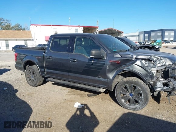 2018 Ford F-150 XL with VIN 1FTEW1EP9JFE03456, listed as a IAAI auction lot 41741500 with 104,123 mi miles. Bid and sale history available at carsss.com. Image 13.