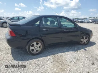 2006 Ford Focus S with VIN 1FAFP34N76W246035, listed as a Copart auction lot 61985015 with 196,498 mi miles and Salvage title. Bid and sale history available at DreamBid. Image 3.