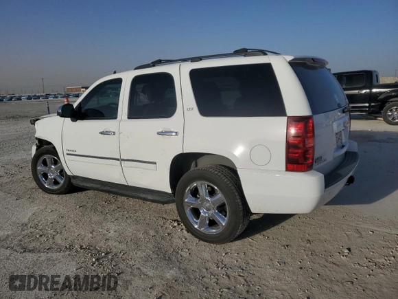 2013 Chevrolet Tahoe LTZ with VIN 1GNSCCE08DR102648, listed as a Copart auction lot 49677345 with 226,528 mi miles and Salvage title. Bid and sale history available at DreamBid. Image 2.