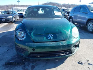 2017 Volkswagen Beetle 1.8T Fleet with VIN 3VWF17AT6HM618275, listed as a IAAI auction lot 41318611 with 134,594 mi miles. Bid and sale history available at carsss.com. Image 11.