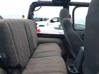 2003 Jeep Wrangler Sport with VIN 1J4FA49S63P324904, listed as a IAAI auction lot 42138001 with 170,917 mi miles and . Bid and sale history available at DreamBid. Image 8.