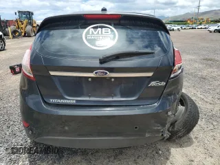 2014 Ford Fiesta Titanium z VIN 3FADP4FJXEM228098, wystawiony jako Copart lot #55173975 z przebiegiem 109 311 mil mil oraz Szkoda całkowita • Salvage title. Historia ofert i sprzedaży dostępna na DreamBid. Obrazek 6.