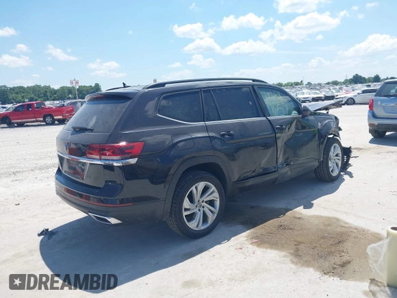 2021 Volkswagen Atlas SE with VIN 1V2WR2CAXMC586838, listed as a IAAI auction lot 42581657 with 60,922 mi miles and . Bid and sale history available at DreamBid. Image 4.