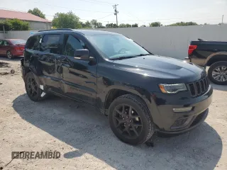 2019 Jeep Grand Cherokee Limited with VIN 1C4RJFBG1KC768153, listed as a Copart auction lot 59711115 with 76,507 mi miles and Salvage title. Bid and sale history available at DreamBid. Image 4.