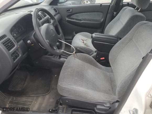 1998 Mazda Protege DX with VIN JM1BC1415W0202950, listed as a Copart auction lot 71992944 with 98,689 mi miles and Salvage Title. Bid and sale history available at carsss.com. Image 7.