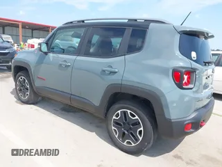 2015 Jeep Renegade Trailhawk with VIN ZACCJBCT8FPB33586, listed as a IAAI auction lot 42590207 with 127,168 mi miles and . Bid and sale history available at DreamBid. Image 3.
