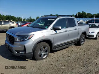 2022 Honda Ridgeline RTL with VIN 5FPYK3F57NB003379, listed as a Copart auction lot 62636255 with 36,770 mi miles and Salvage title. Bid and sale history available at DreamBid. Image 1.